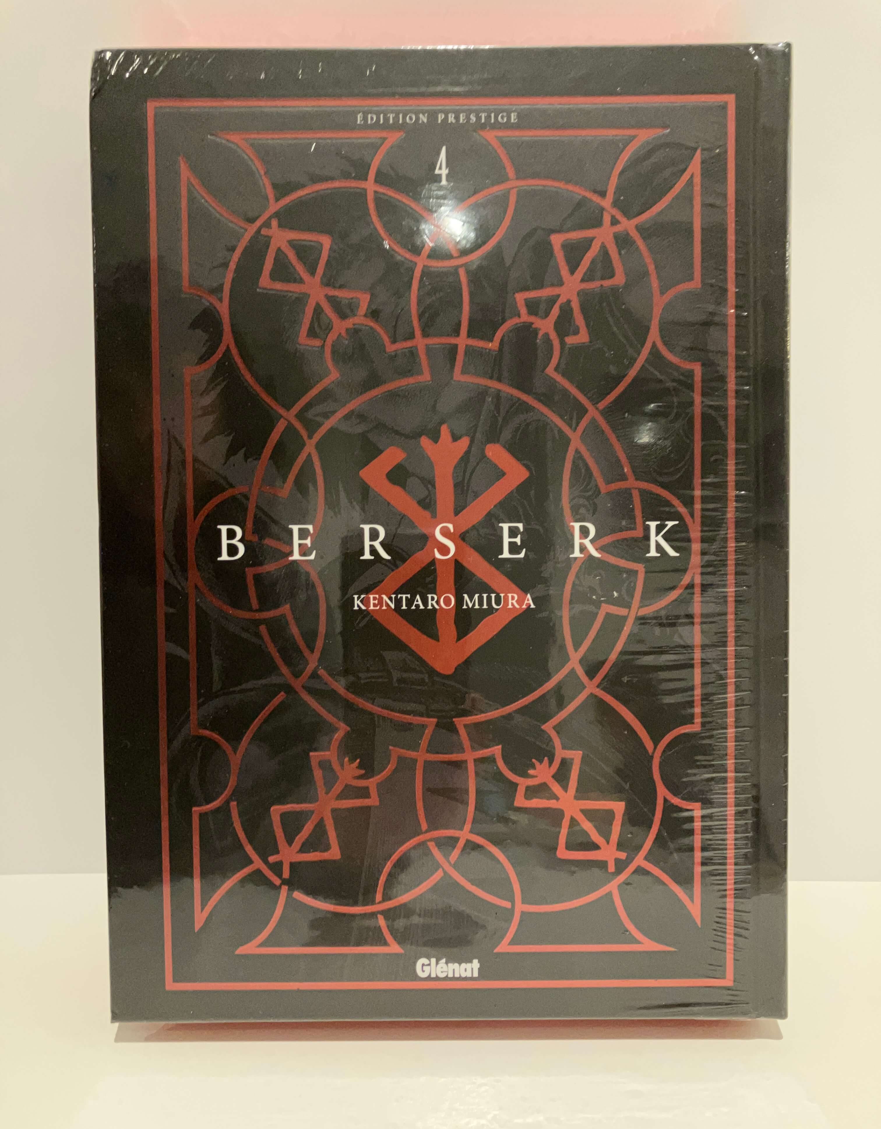 le fond noir avec logo berserk et le titre en lettres blanches au milieu