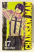 Couverture Chainsaw Man tome 17, personnage en chemise, fond jaune, manga Tatsuki Fujimoto.