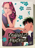 Couverture manga Criminelles Fiançailles tome 3, femme aux cheveux violets et homme aux cheveux verts, fleurs bleues, Asuka Konishi, Pika Edition.