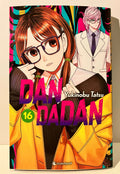 Couverture manga Dandadan tome 16, personnages en lunettes et costume, fond coloré, Yukinobu Tatsu