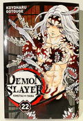 Couverture Demon Slayer tome 22 avec personnage aux cheveux blancs, torse nu, marques rouges.