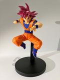 Figurine Dragon Ball Super Son Goku Super Saiyan God sur socle noir, tenue orange et bleue