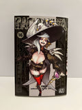 Couverture de manga Gachiakuta tome 16 : une femme aux cheveux blancs en tenue sombre et chapeau pointu tient un sceptre, sur fond noir aux motifs détaillés.