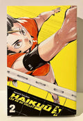 Couverture du manga Haikyū tome 2 avec joueur de volley en action sur fond jaune