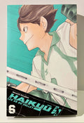 Couverture manga Haikyu tome 6, joueur de volley en action, filet et fond turquoise