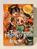 Couverture orange du manga Toilet-bound Hanako-Kun avec deux personnages aux oreilles de chat, édition collector Pika