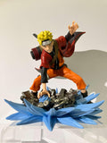 Figurine Naruto Shippuden Uzumaki Naruto Banpresto en action sur base bleue décorative