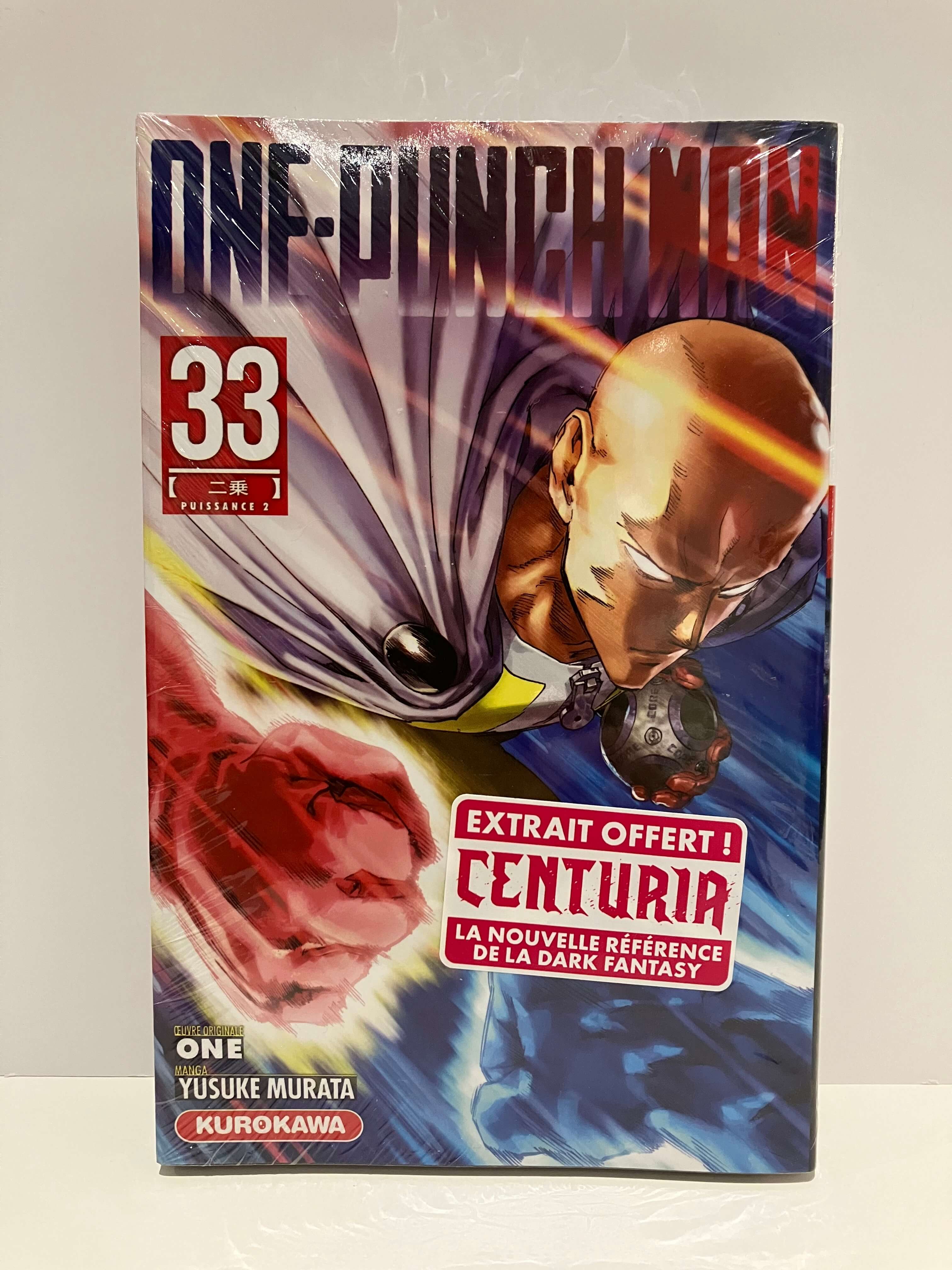 un super-héros chauve en cape blanche donne un coup de poing puissant, avec le titre en haut et un encart rouge annonçant un extrait offert.