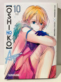 Couverture manga Oshi no Ko tome 10, personnage Aqua aux cheveux blonds et yeux bleus, édition Kurokawa.