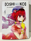 Couverture manga Oshi no Ko tome 4, personnage fille aux cheveux rouges, tenue rose et gants jaunes