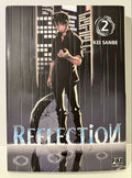 Couverture manga Reflection tome 2 Kei Sanbe, personnage masculin sous la pluie, nuit en ville