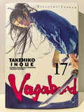Couverture du manga Vagabond tome 17, guerrier blessé en kimono bleu tenant un sabre, art de Takehiko Inoue
