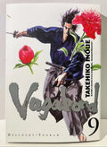 Couverture Vagabond tome 9, samouraï avec sabre, fleurs rouges, manga Takehiko Inoue