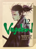 Couverture manga Vagabond tome 12 avec un samouraï illustré, texte vert, Takehiko Inoue.