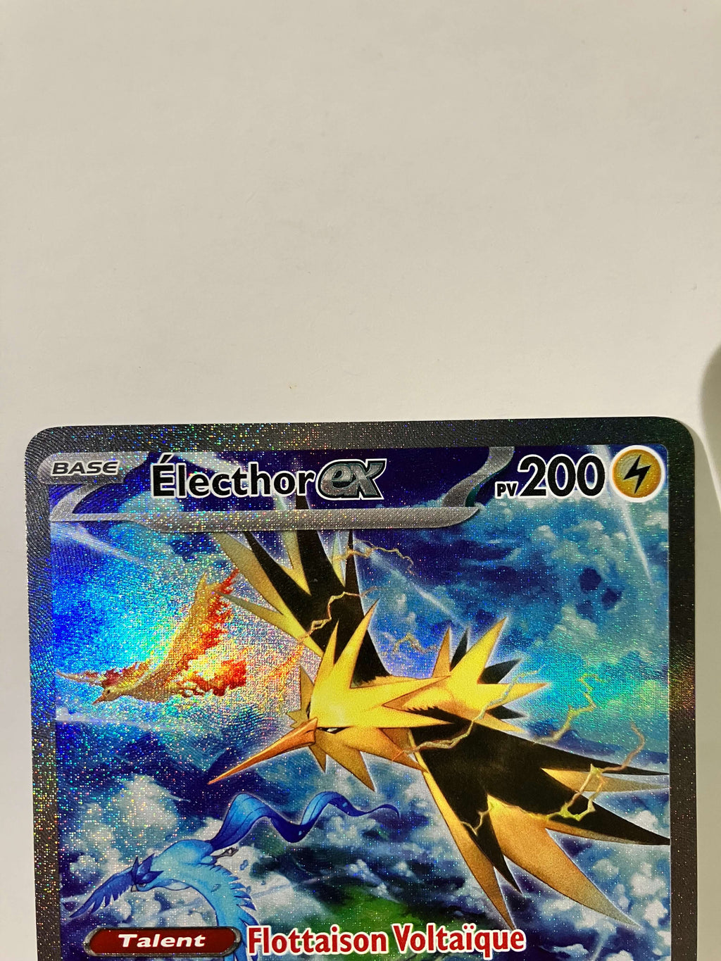 Carte Pokémon Électhor EX brillante, fond coloré, motif oiseau légendaire